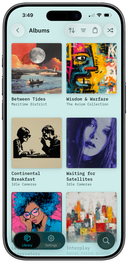 BitDek music library showing album grid with artwork